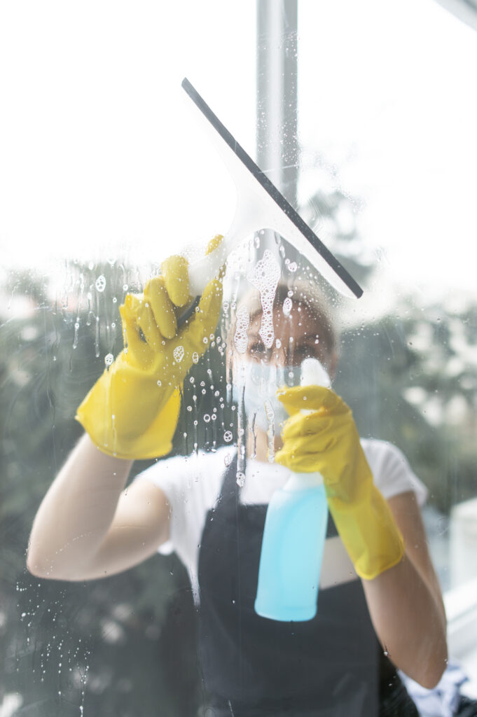 person-taking-care-office-cleaning